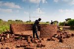 working with locals build new homes